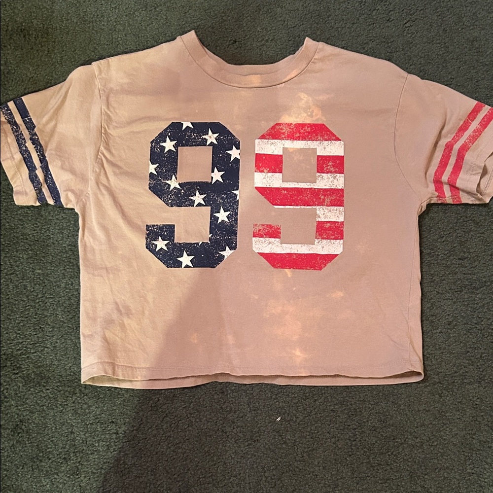 Cropped Tan Graphic Tee with '99' Stars & Stripes Detail